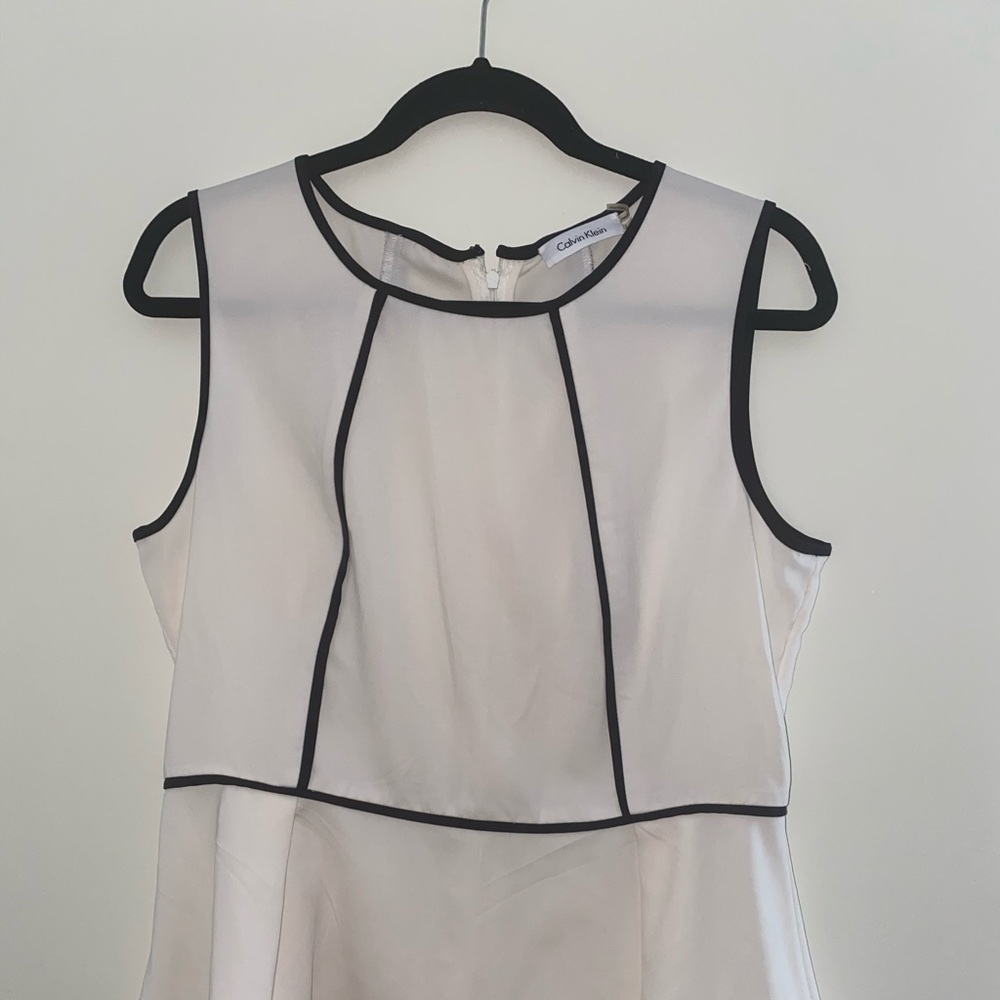 Sleeveless Peplum White blouse